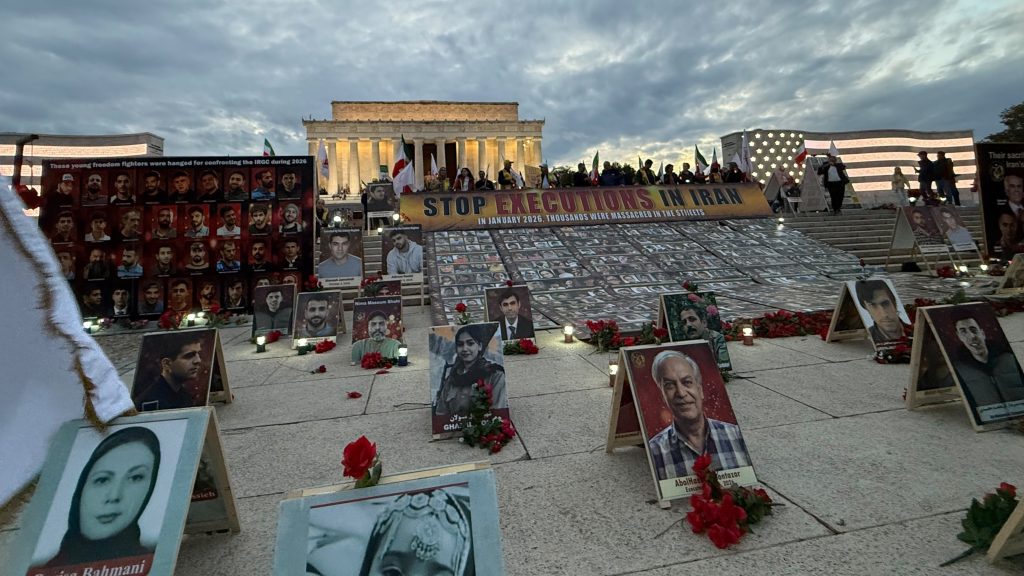 NCRI Supporters hold a candlelight vigil and photo exhibition honoring victims of repression and political executions at the Lincoln Memorial, calling for an immediate halt to executions, freedom for political prisoners and international accountability for regime officials.