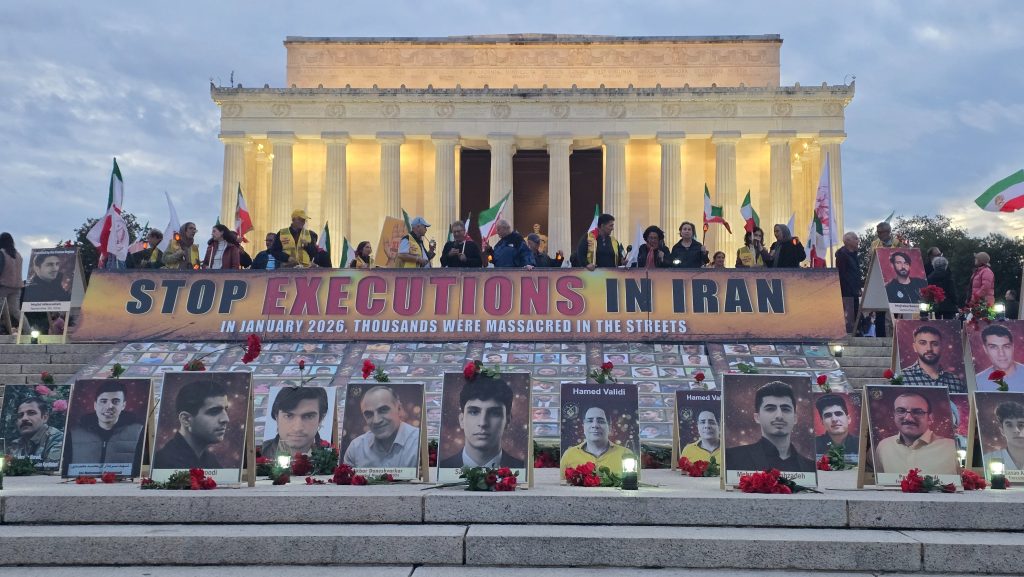 NCRI Supporters hold a candlelight vigil and photo exhibition honoring victims of repression and political executions, calling for an immediate halt to executions, freedom for political prisoners and international accountability for regime officials.